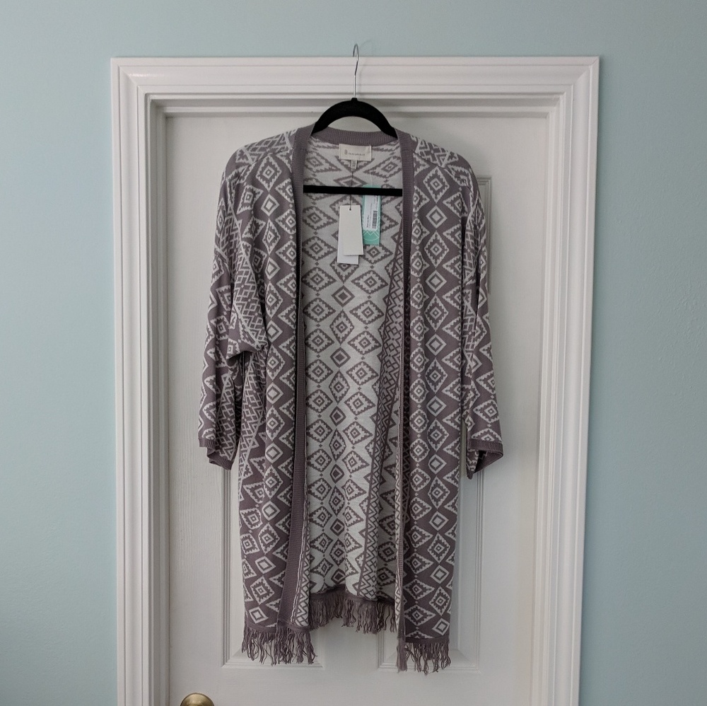 Woman's long mid thigh legth sweater